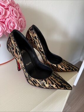 Christian Louboutin
Miss Z Ocelot 100 Leather Pump